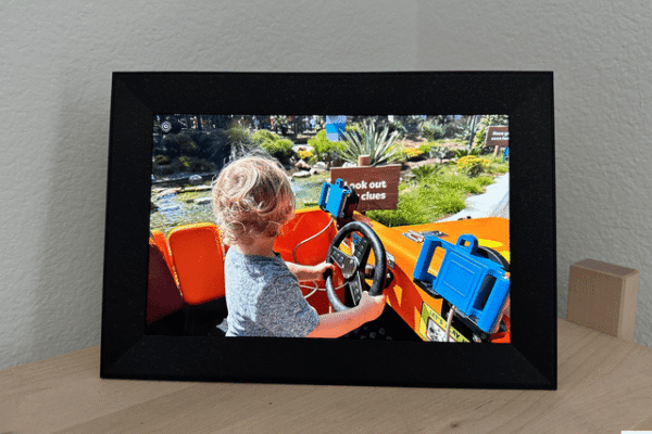 Image may contain: Person, Chair, Furniture, Computer Hardware, Electronics, Hardware, Monitor, Screen, and Photo Frame