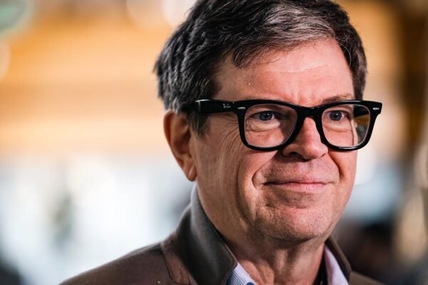 Image may contain Yann LeCun Face Happy Head Person Smile Photography Portrait Dimples Adult and Accessories
